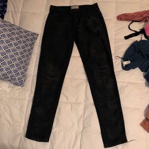 Free People distressed “jeans”